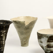 gốm maker is the ceramic practice of Thannie Phan, a Vietnamese artist and potter now based in Naarm.  Thannie's practice is a physical interpretation of the stories she writes about where she is, where she was, and the people surrounding her. The works are hand-built by pinching coils, glazed by brushing or stamping.