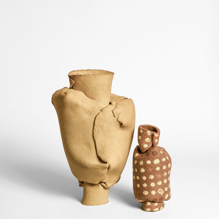 ANNA GLEESON is an Australian artist now based in New-York. Anna creates contemporary ceramic sculptures using traditional hand-building techniques which she manipulates in order to distort the expected aesthetic of a vessel, creating playful and intriguing sculptures. 