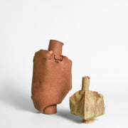 ANNA GLEESON is an Australian artist now based in New-York. Anna creates contemporary ceramic sculptures using traditional hand-building techniques which she manipulates in order to distort the expected aesthetic of a vessel, creating playful and intriguing sculptures. 