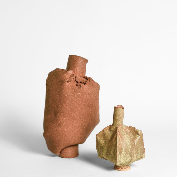 ANNA GLEESON is an Australian artist now based in New-York. Anna creates contemporary ceramic sculptures using traditional hand-building techniques which she manipulates in order to distort the expected aesthetic of a vessel, creating playful and intriguing sculptures. 