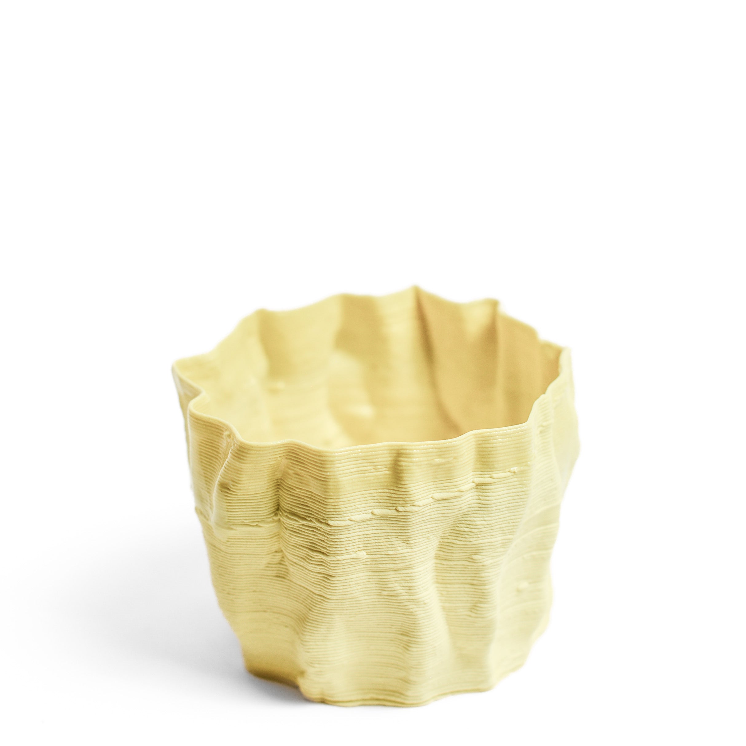 Porcelain cup made by Alterfact using 3D printing techniques in clay. Alterfact is an Australian duo composed of ceramicist Lucile Sciallano and designer Ben Landau based in Melbourne where they create contemporary ceramics using 3D printing techniques.