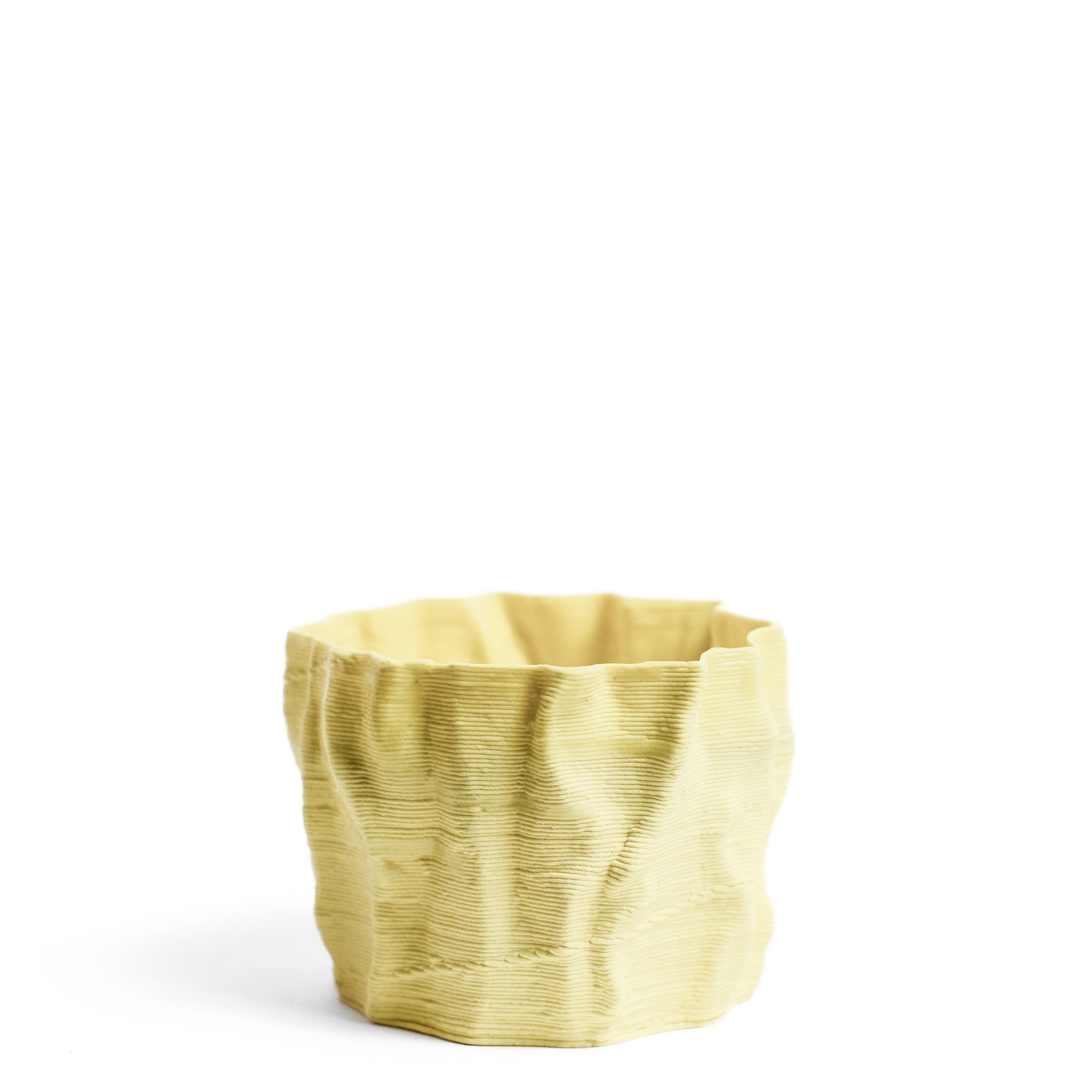 Porcelain cup made by Alterfact using 3D printing techniques in clay. Alterfact is an Australian duo composed of ceramicist Lucile Sciallano and designer Ben Landau based in Melbourne where they create contemporary ceramics using 3D printing techniques.