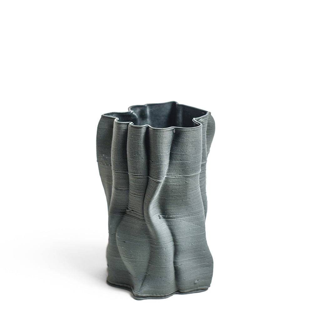 Porcelain sculpture made by Alterfact using 3D printing techniques in clay. Alterfact is an Australian duo composed of ceramicist Lucile Sciallano and designer Ben Landau based in Melbourne where they create contemporary ceramics using 3D printing techniques.