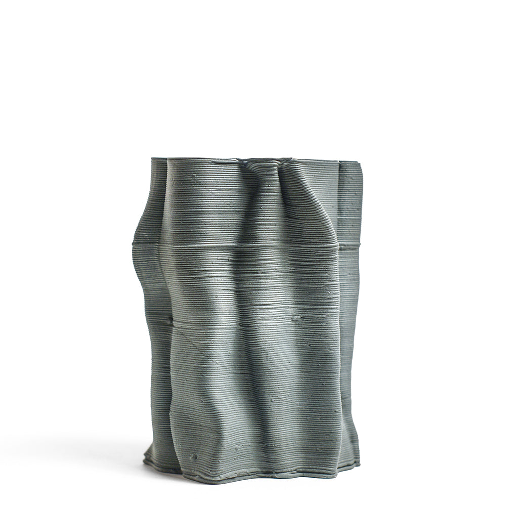 Porcelain sculpture made by Alterfact using 3D printing techniques in clay. Alterfact is an Australian duo composed of ceramicist Lucile Sciallano and designer Ben Landau based in Melbourne where they create contemporary ceramics using 3D printing techniques.