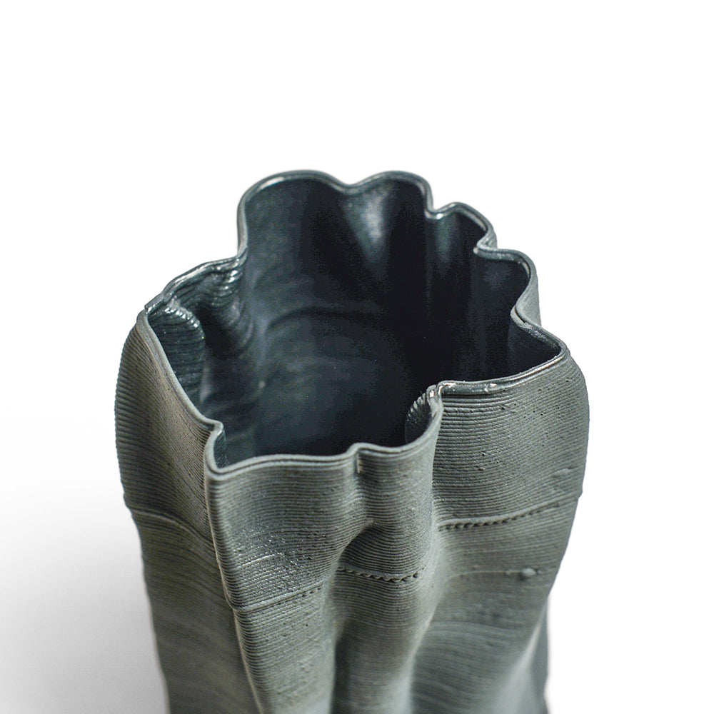 Porcelain sculpture made by Alterfact using 3D printing techniques in clay. Alterfact is an Australian duo composed of ceramicist Lucile Sciallano and designer Ben Landau based in Melbourne where they create contemporary ceramics using 3D printing techniques.