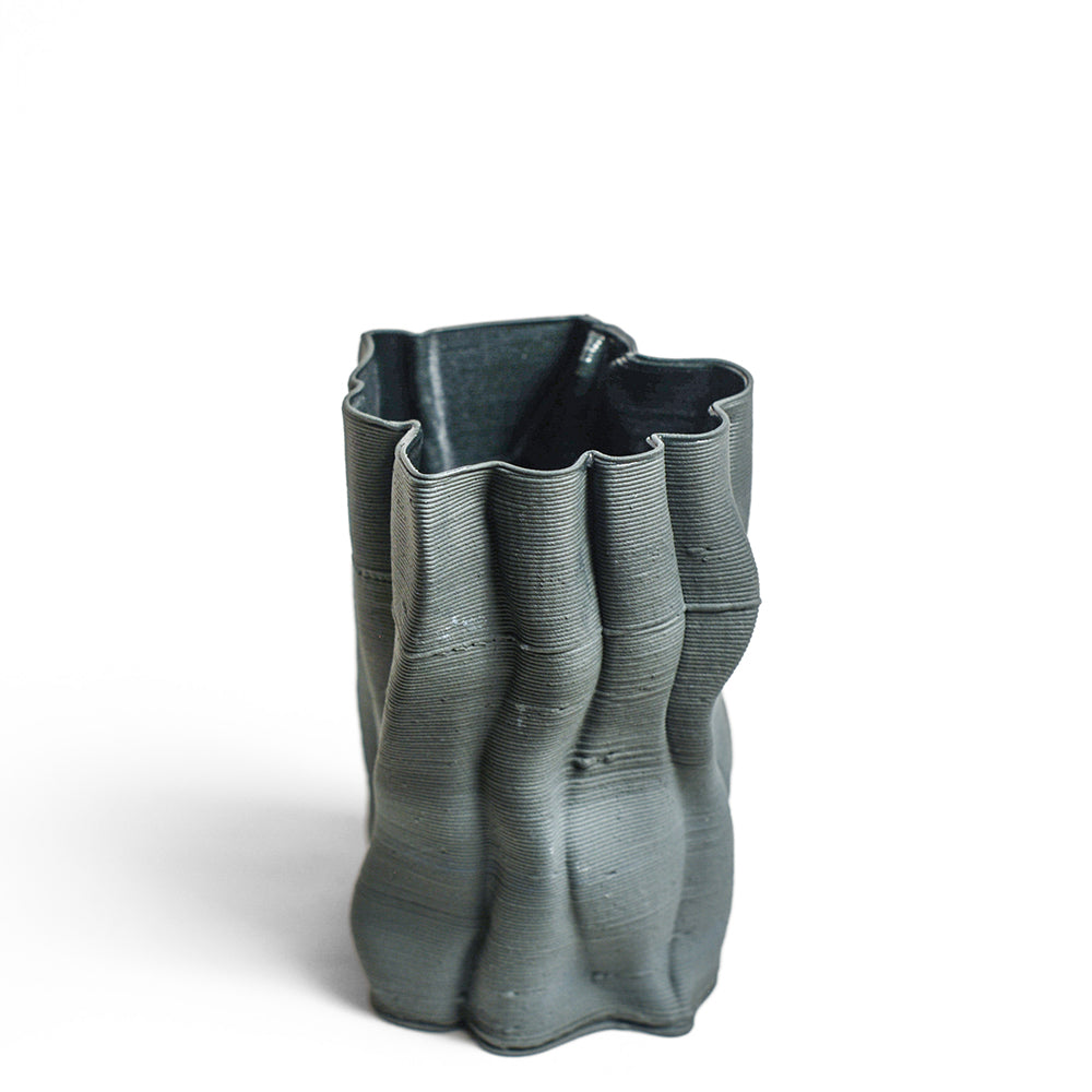 Porcelain sculpture made by Alterfact using 3D printing techniques in clay. Alterfact is an Australian duo composed of ceramicist Lucile Sciallano and designer Ben Landau based in Melbourne where they create contemporary ceramics using 3D printing techniques.