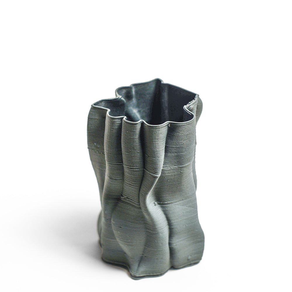 Porcelain sculpture made by Alterfact using 3D printing techniques in clay. Alterfact is an Australian duo composed of ceramicist Lucile Sciallano and designer Ben Landau based in Melbourne where they create contemporary ceramics using 3D printing techniques.