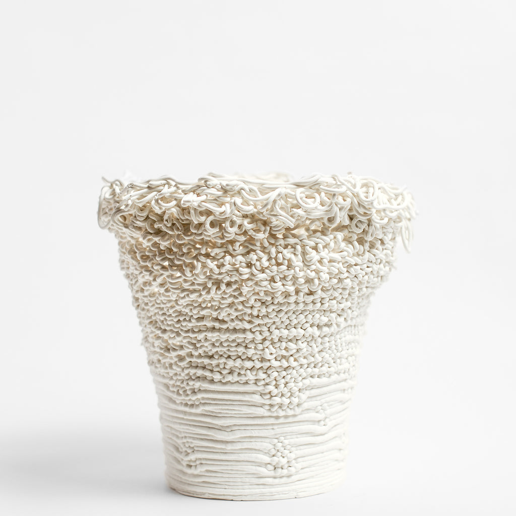 Porcelain sculpture made by Alterfact using 3D printing techniques in clay. Alterfact is an Australian duo composed of ceramicist Lucile Sciallano and designer Ben Landau based in Melbourne where they create contemporary ceramics using 3D printing techniques.