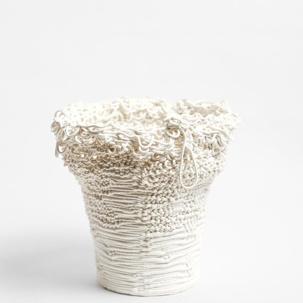 Porcelain sculpture made by Alterfact using 3D printing techniques in clay. Alterfact is an Australian duo composed of ceramicist Lucile Sciallano and designer Ben Landau based in Melbourne where they create contemporary ceramics using 3D printing techniques.
