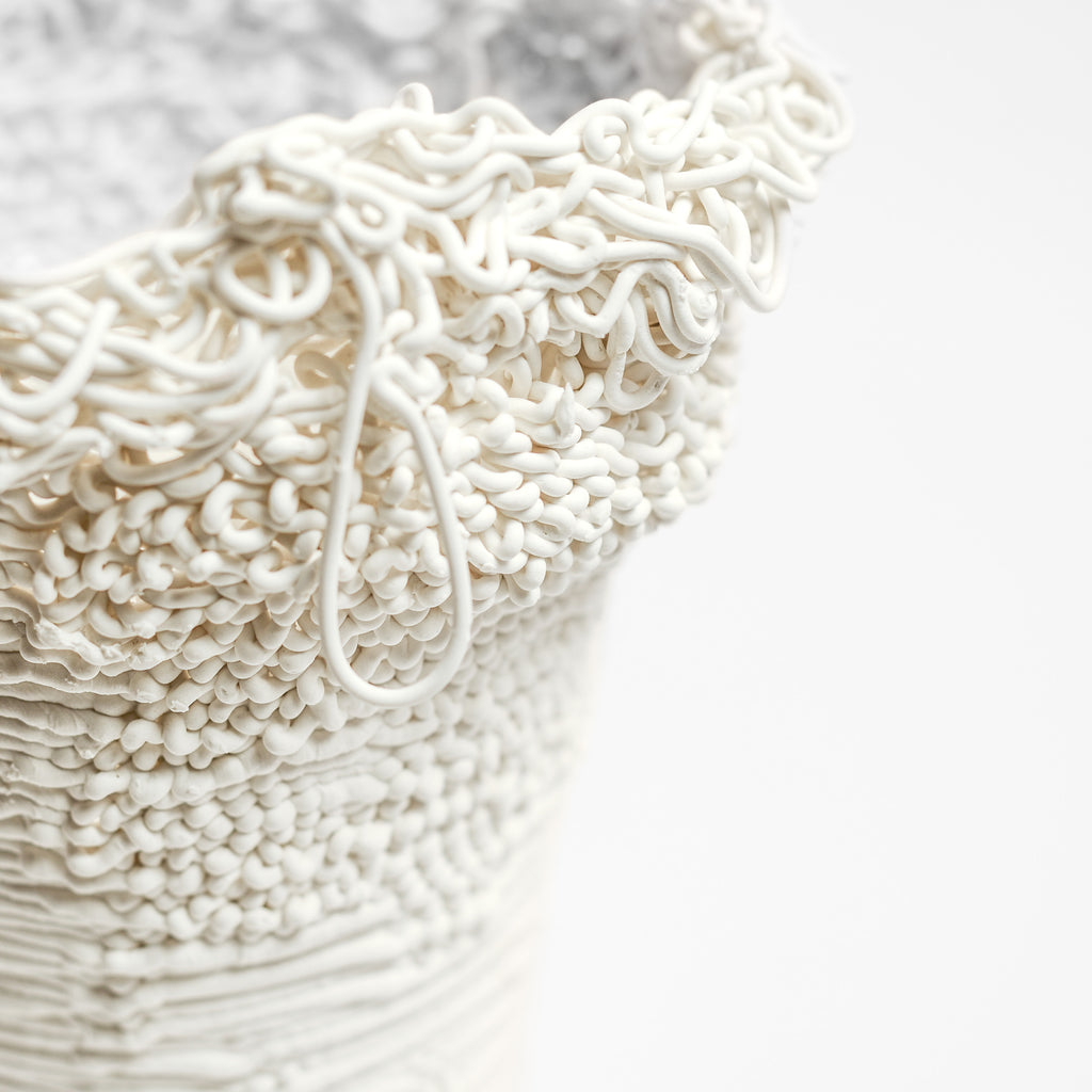 Porcelain sculpture made by Alterfact using 3D printing techniques in clay. Alterfact is an Australian duo composed of ceramicist Lucile Sciallano and designer Ben Landau based in Melbourne where they create contemporary ceramics using 3D printing techniques.