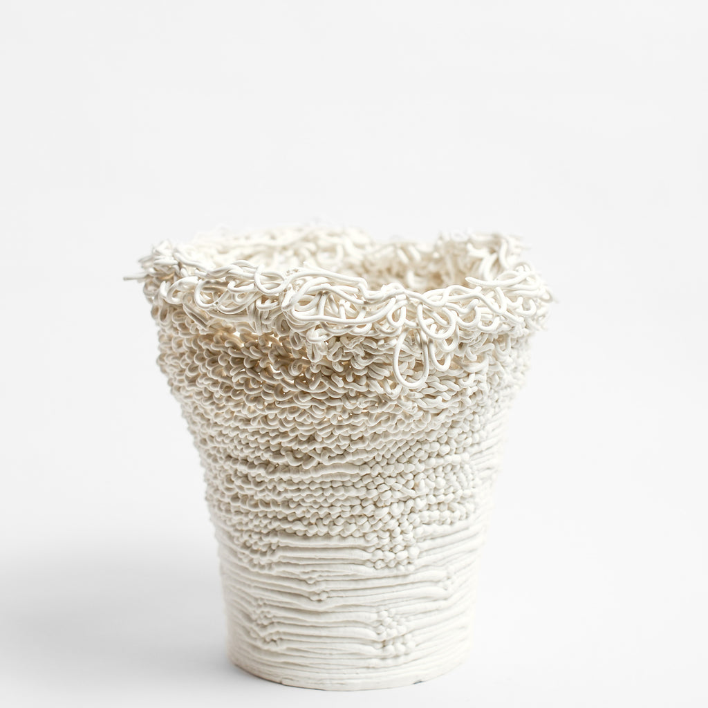 Porcelain sculpture made by Alterfact using 3D printing techniques in clay. Alterfact is an Australian duo composed of ceramicist Lucile Sciallano and designer Ben Landau based in Melbourne where they create contemporary ceramics using 3D printing techniques.