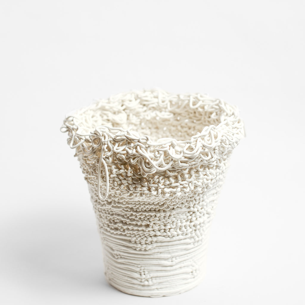 Porcelain sculpture made by Alterfact using 3D printing techniques in clay. Alterfact is an Australian duo composed of ceramicist Lucile Sciallano and designer Ben Landau based in Melbourne where they create contemporary ceramics using 3D printing techniques.