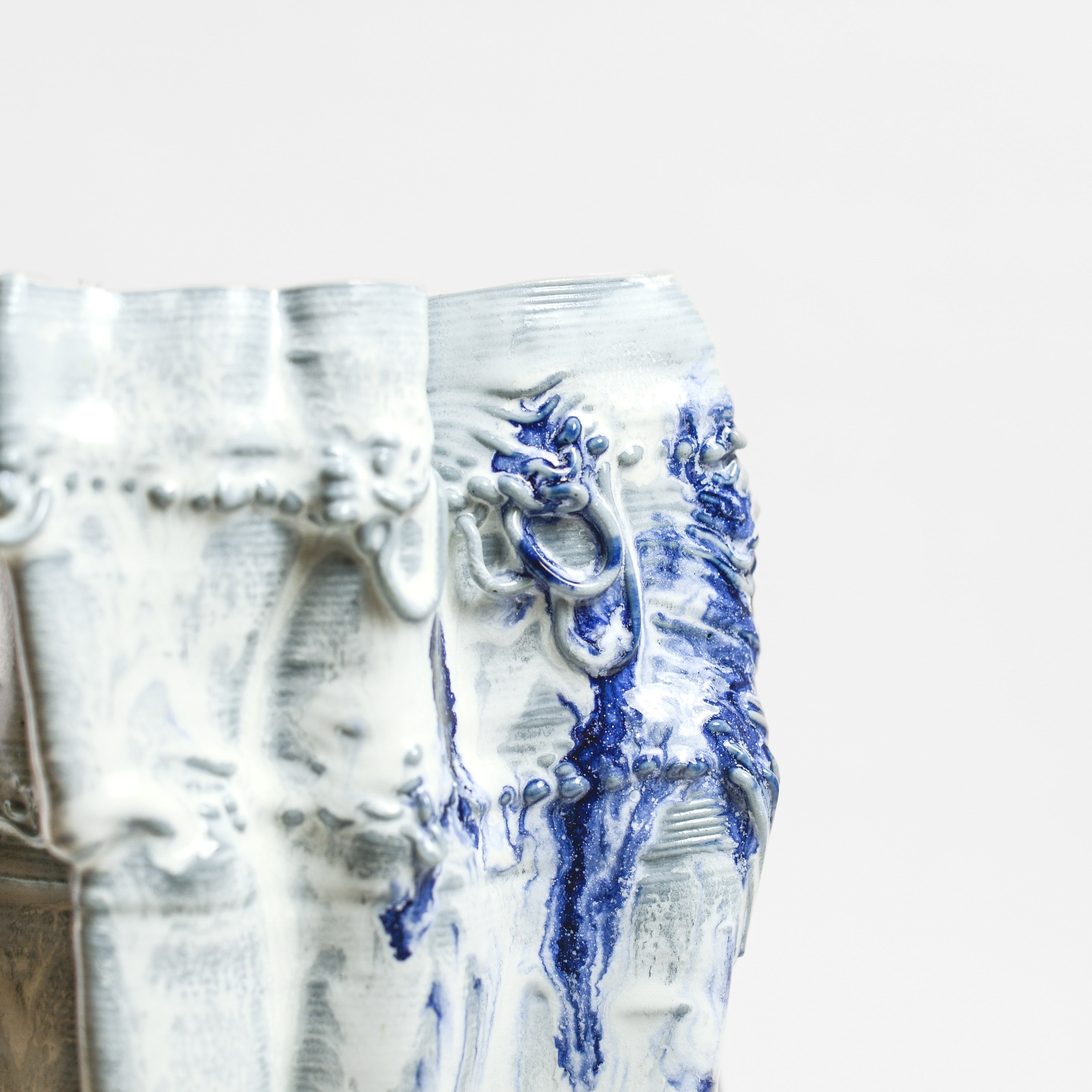 Porcelain sculpture made by Alterfact using 3D printing techniques in clay. Alterfact is an Australian duo composed of ceramicist Lucile Sciallano and designer Ben Landau based in Melbourne where they create contemporary ceramics using 3D printing techniques.