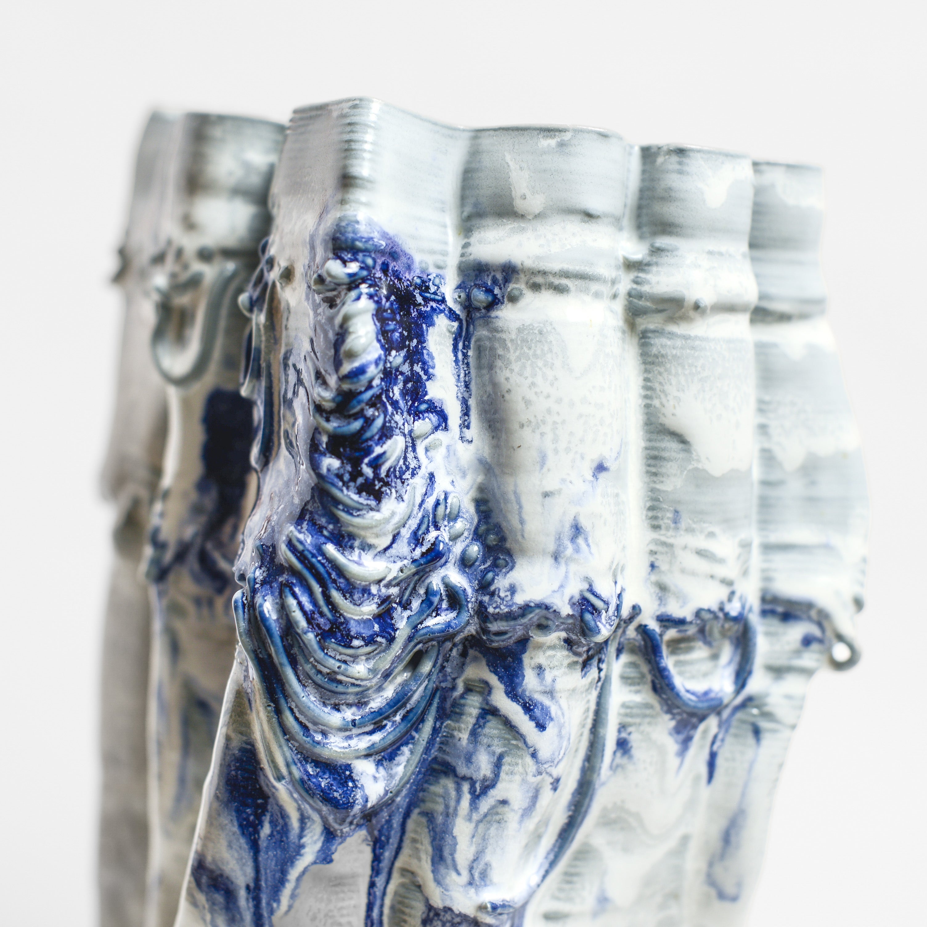 Porcelain sculpture made by Alterfact using 3D printing techniques in clay. Alterfact is an Australian duo composed of ceramicist Lucile Sciallano and designer Ben Landau based in Melbourne where they create contemporary ceramics using 3D printing techniques.