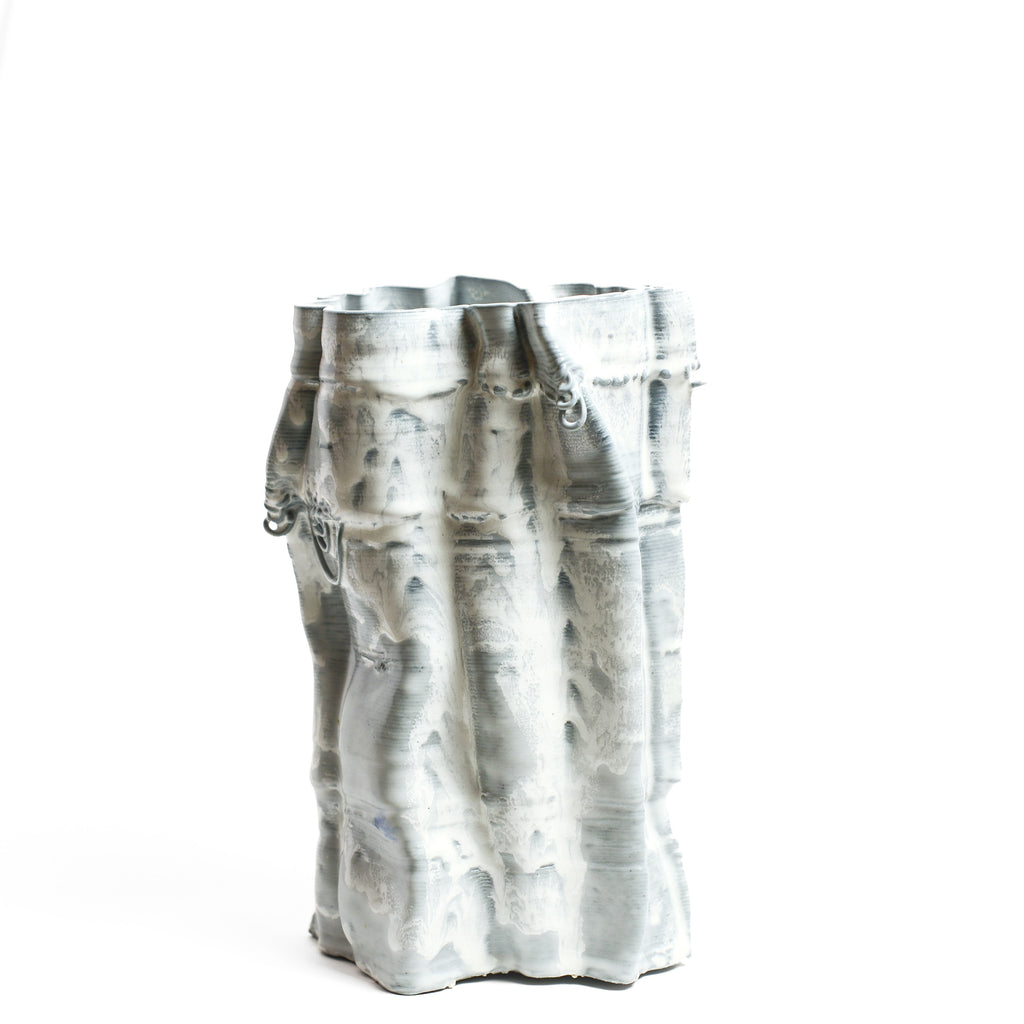 Porcelain sculpture made by Alterfact using 3D printing techniques in clay. Alterfact is an Australian duo composed of ceramicist Lucile Sciallano and designer Ben Landau based in Melbourne where they create contemporary ceramics using 3D printing techniques.