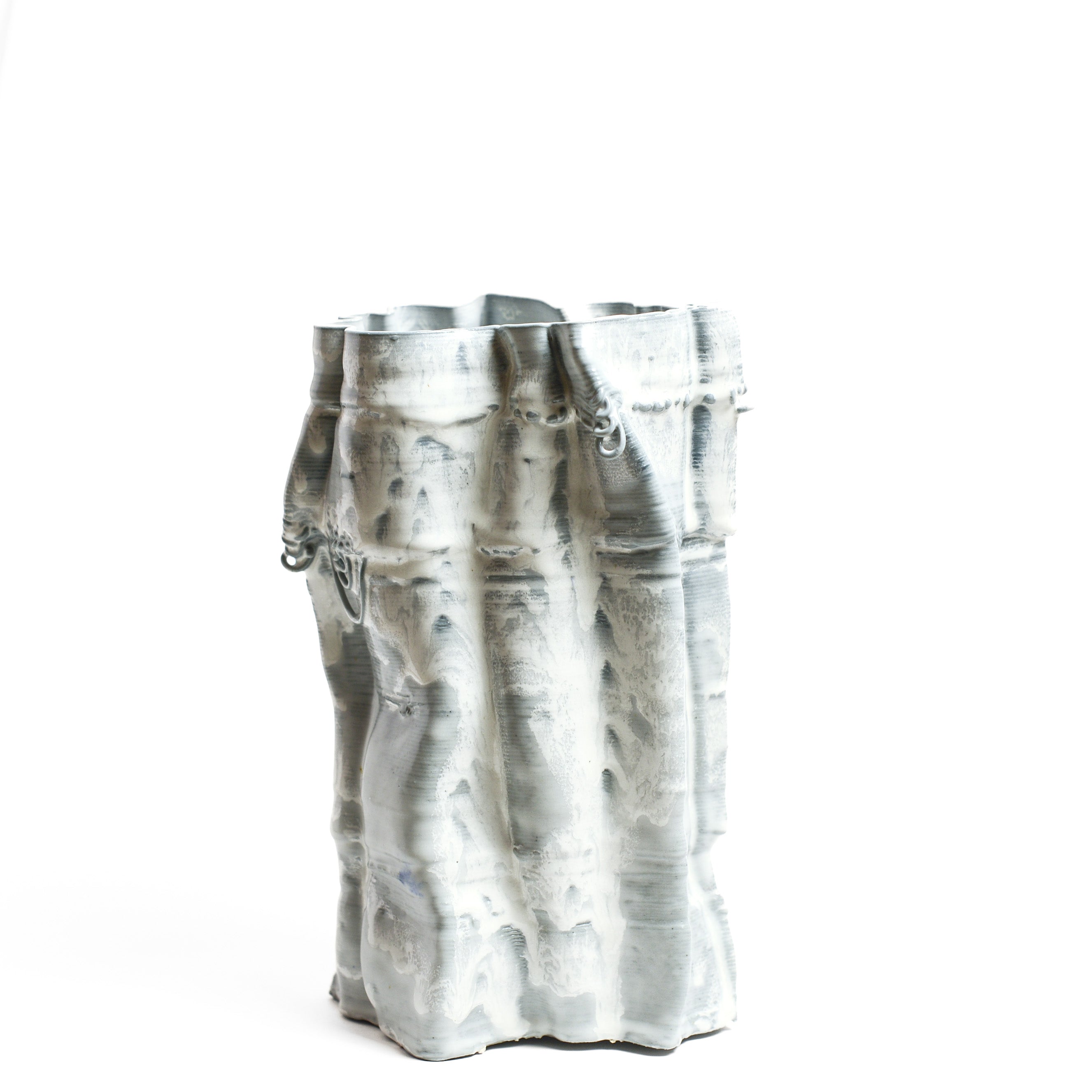 Porcelain sculpture made by Alterfact using 3D printing techniques in clay. Alterfact is an Australian duo composed of ceramicist Lucile Sciallano and designer Ben Landau based in Melbourne where they create contemporary ceramics using 3D printing techniques.