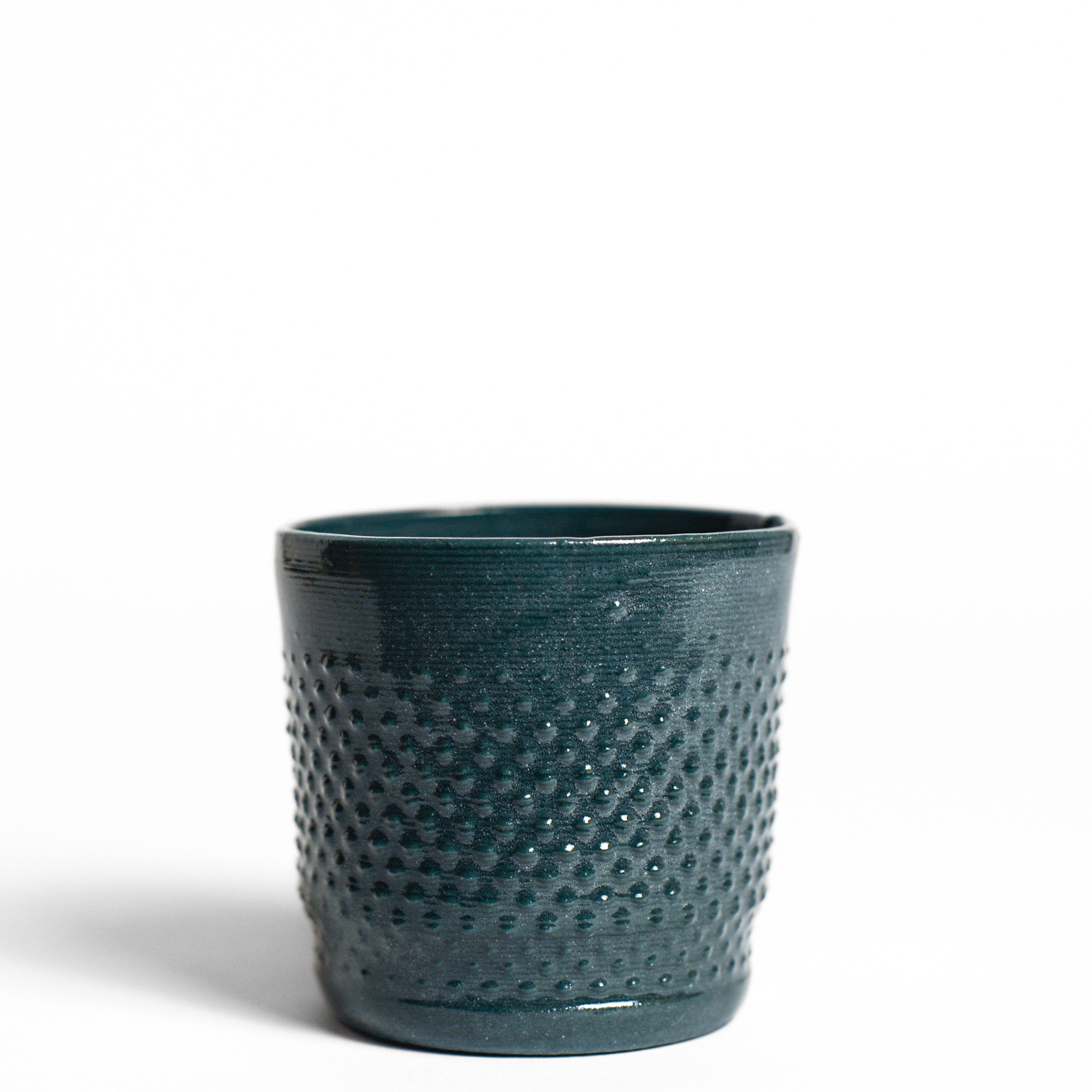 Porcelain cup made by Alterfact using 3D printing techniques in clay. Alterfact is an Australian duo composed of ceramicist Lucile Sciallano and designer Ben Landau based in Melbourne where they create contemporary ceramics using 3D printing techniques.