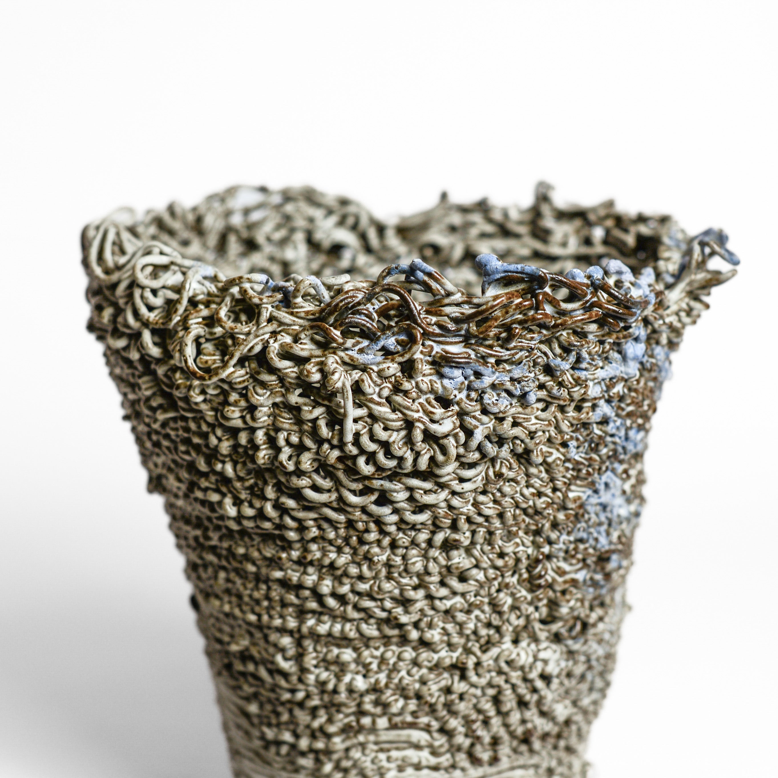 Porcelain cup made by Alterfact using 3D printing techniques in clay. Alterfact is an Australian duo composed of ceramicist Lucile Sciallano and designer Ben Landau based in Melbourne where they create contemporary ceramics using 3D printing techniques.