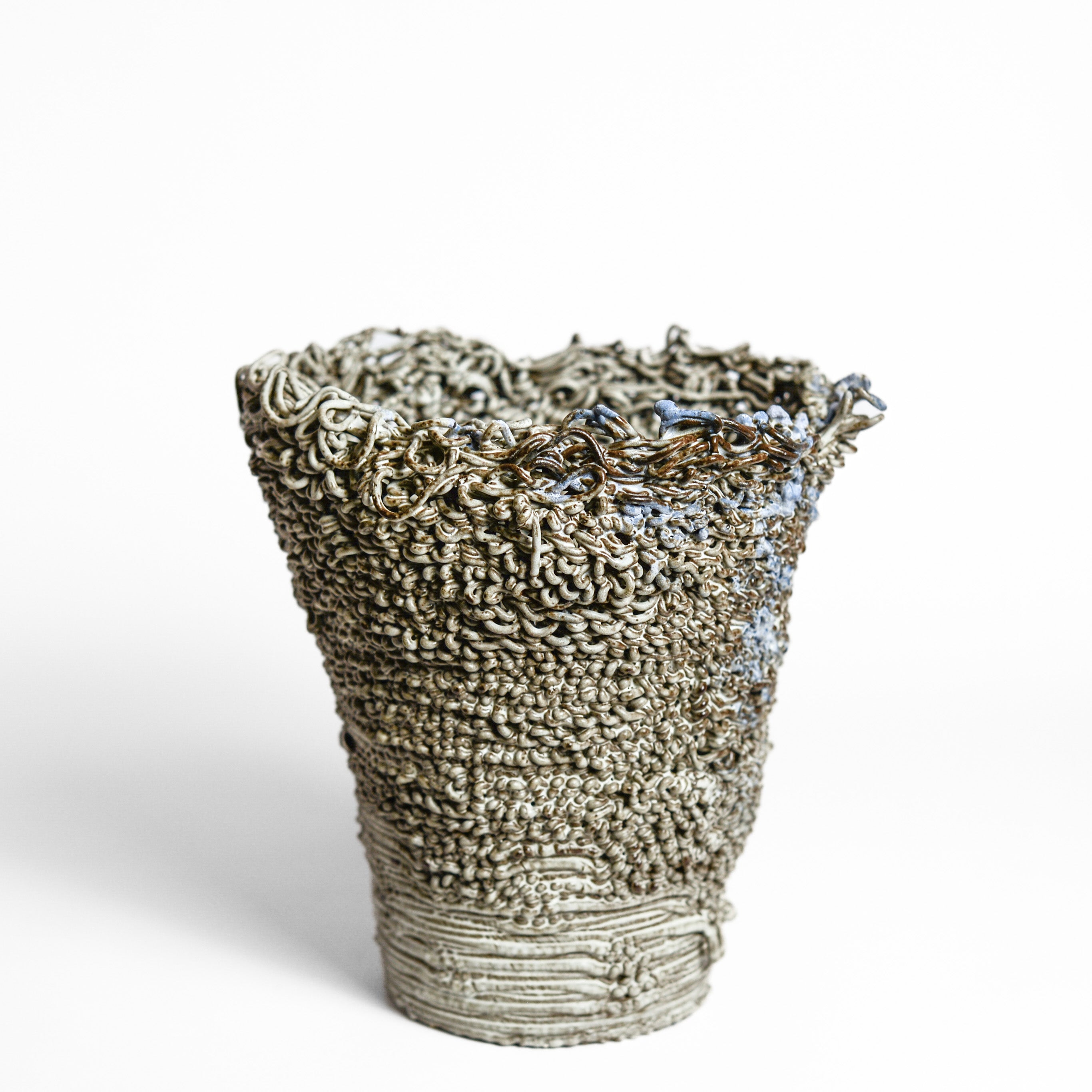 Porcelain cup made by Alterfact using 3D printing techniques in clay. Alterfact is an Australian duo composed of ceramicist Lucile Sciallano and designer Ben Landau based in Melbourne where they create contemporary ceramics using 3D printing techniques.