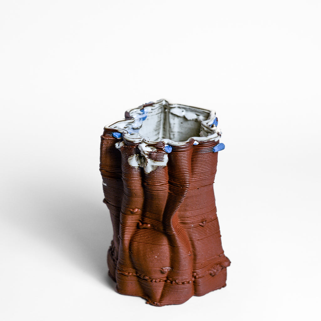 Porcelain sculpture made by Alterfact using 3D printing techniques in clay. Alterfact is an Australian duo composed of ceramicist Lucile Sciallano and designer Ben Landau based in Melbourne where they create contemporary ceramics using 3D printing techniques.