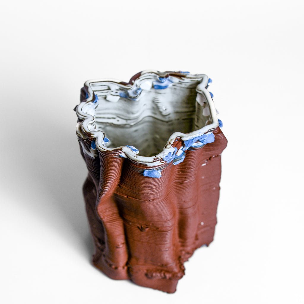 Porcelain sculpture made by Alterfact using 3D printing techniques in clay. Alterfact is an Australian duo composed of ceramicist Lucile Sciallano and designer Ben Landau based in Melbourne where they create contemporary ceramics using 3D printing techniques.