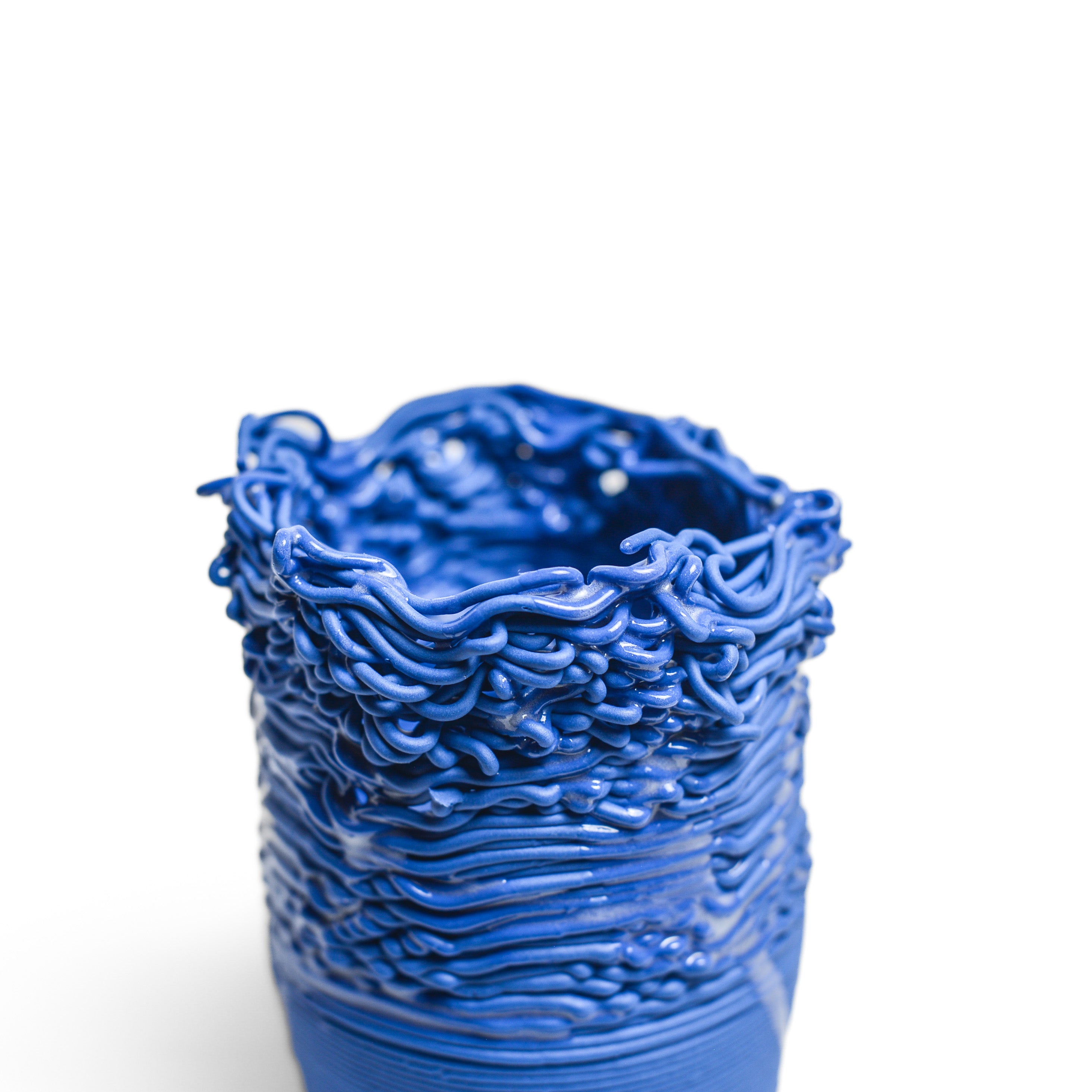 Porcelain sculpture made by Alterfact using 3D printing techniques in clay. Alterfact is an Australian duo composed of ceramicist Lucile Sciallano and designer Ben Landau based in Melbourne where they create contemporary ceramics using 3D printing techniques.