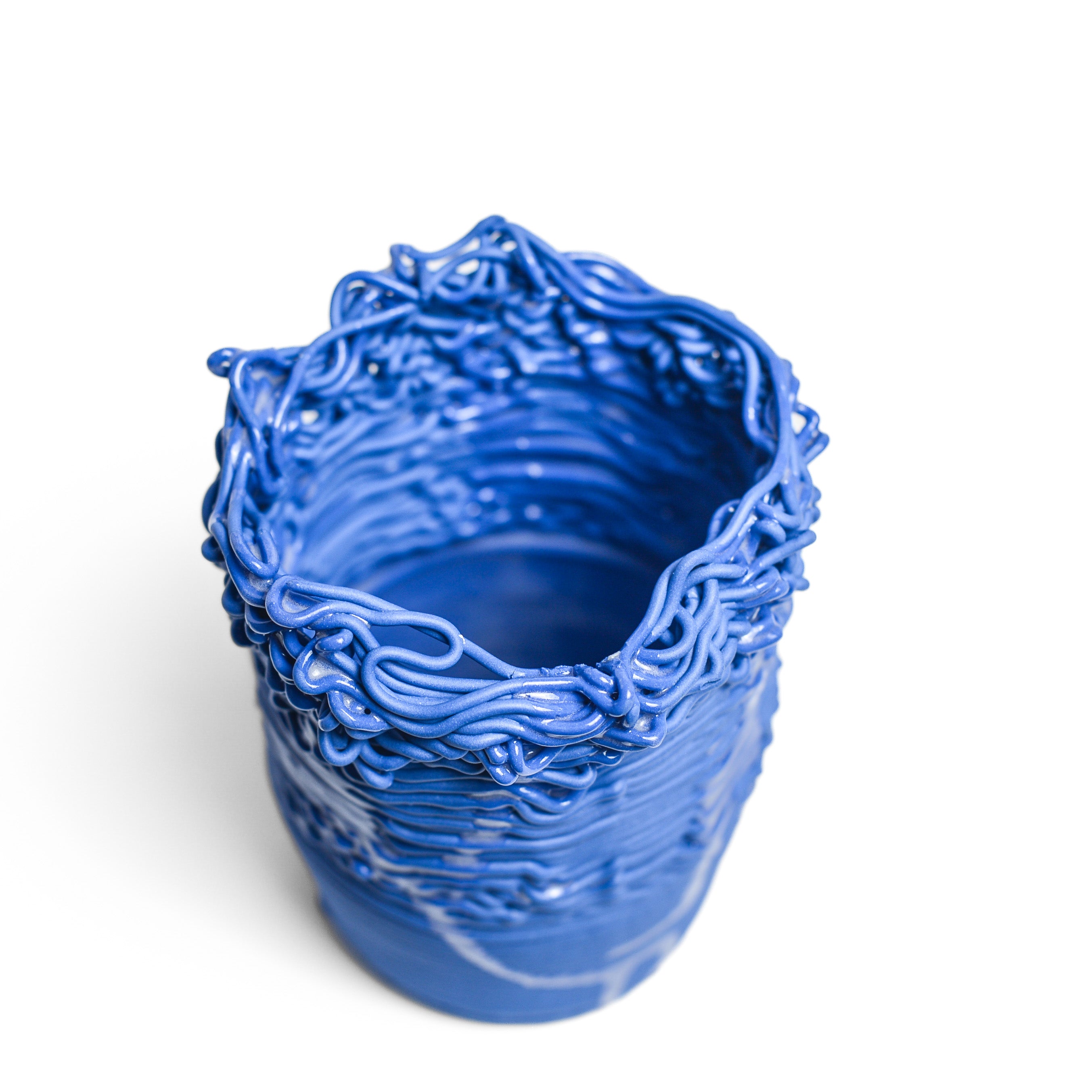 Porcelain sculpture made by Alterfact using 3D printing techniques in clay. Alterfact is an Australian duo composed of ceramicist Lucile Sciallano and designer Ben Landau based in Melbourne where they create contemporary ceramics using 3D printing techniques.