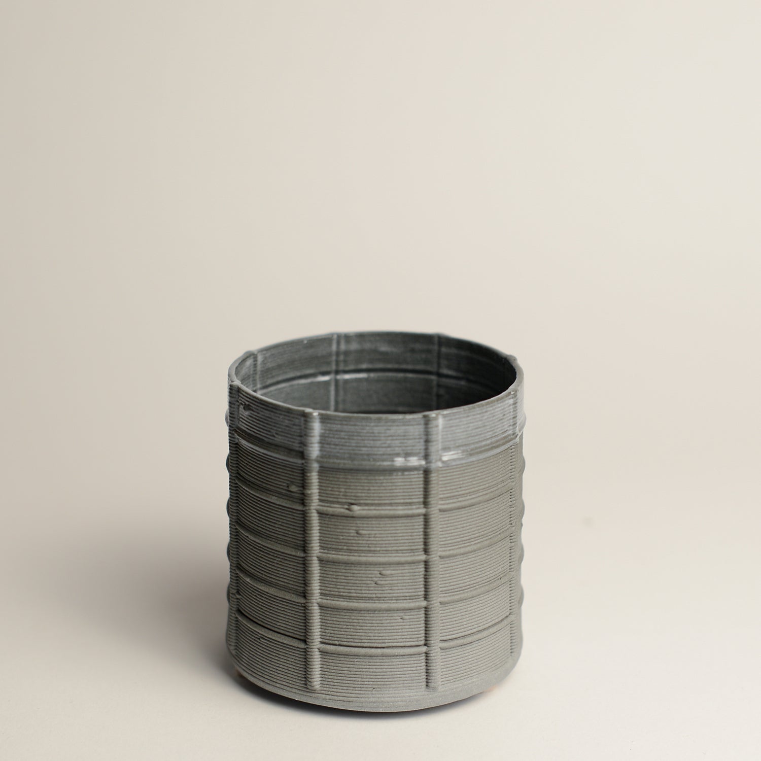 Porcelain cup made by Alterfact using 3D printing techniques in clay. Alterfact is an Australian duo composed of ceramicist Lucile Sciallano and designer Ben Landau based in Melbourne where they create contemporary ceramics using 3D printing techniques.