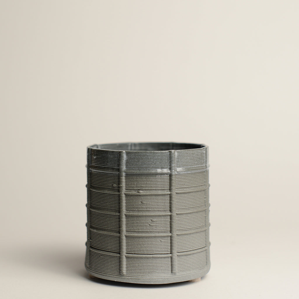 Porcelain cup made by Alterfact using 3D printing techniques in clay. Alterfact is an Australian duo composed of ceramicist Lucile Sciallano and designer Ben Landau based in Melbourne where they create contemporary ceramics using 3D printing techniques.