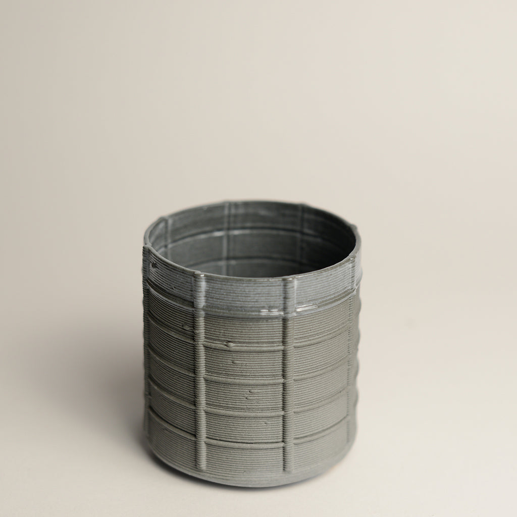 Porcelain cup made by Alterfact using 3D printing techniques in clay. Alterfact is an Australian duo composed of ceramicist Lucile Sciallano and designer Ben Landau based in Melbourne where they create contemporary ceramics using 3D printing techniques.