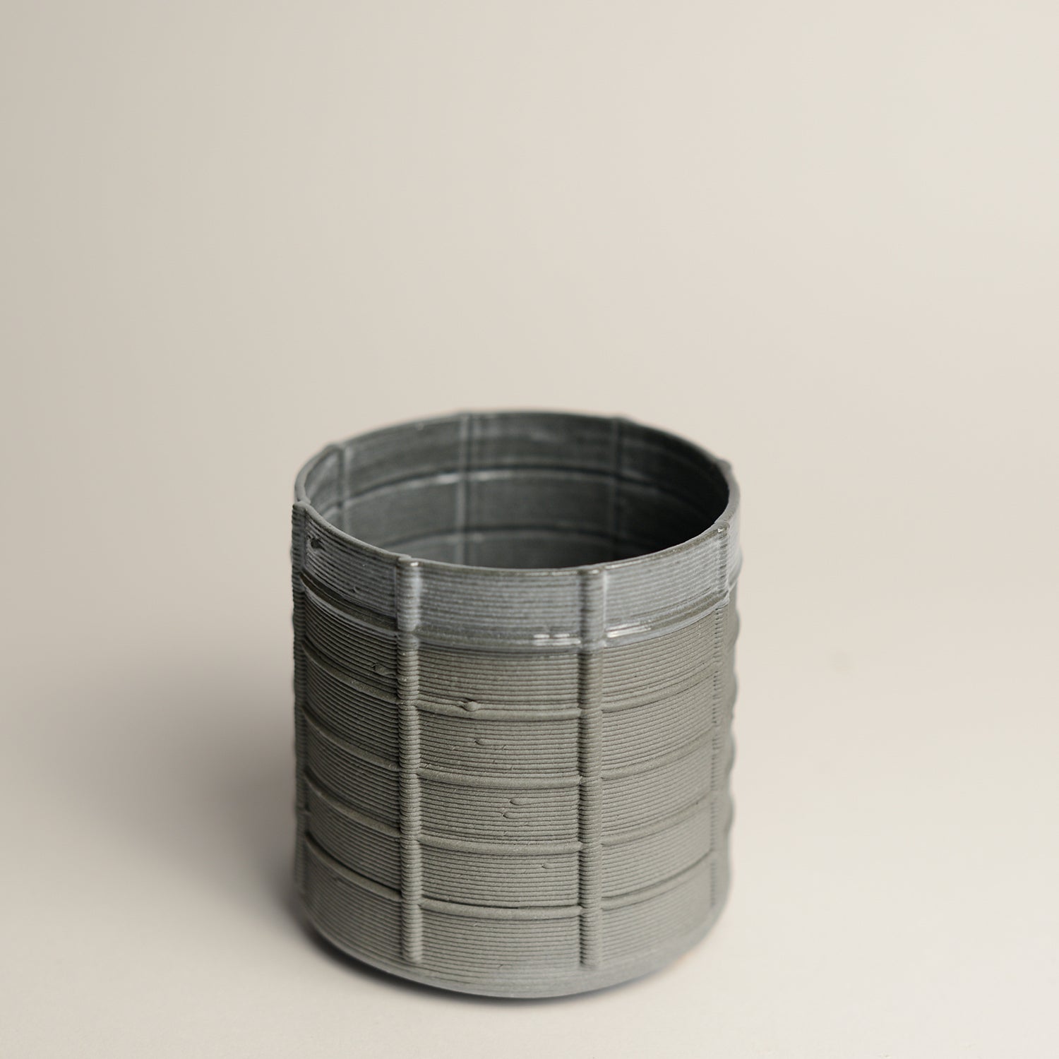 Porcelain cup made by Alterfact using 3D printing techniques in clay. Alterfact is an Australian duo composed of ceramicist Lucile Sciallano and designer Ben Landau based in Melbourne where they create contemporary ceramics using 3D printing techniques.