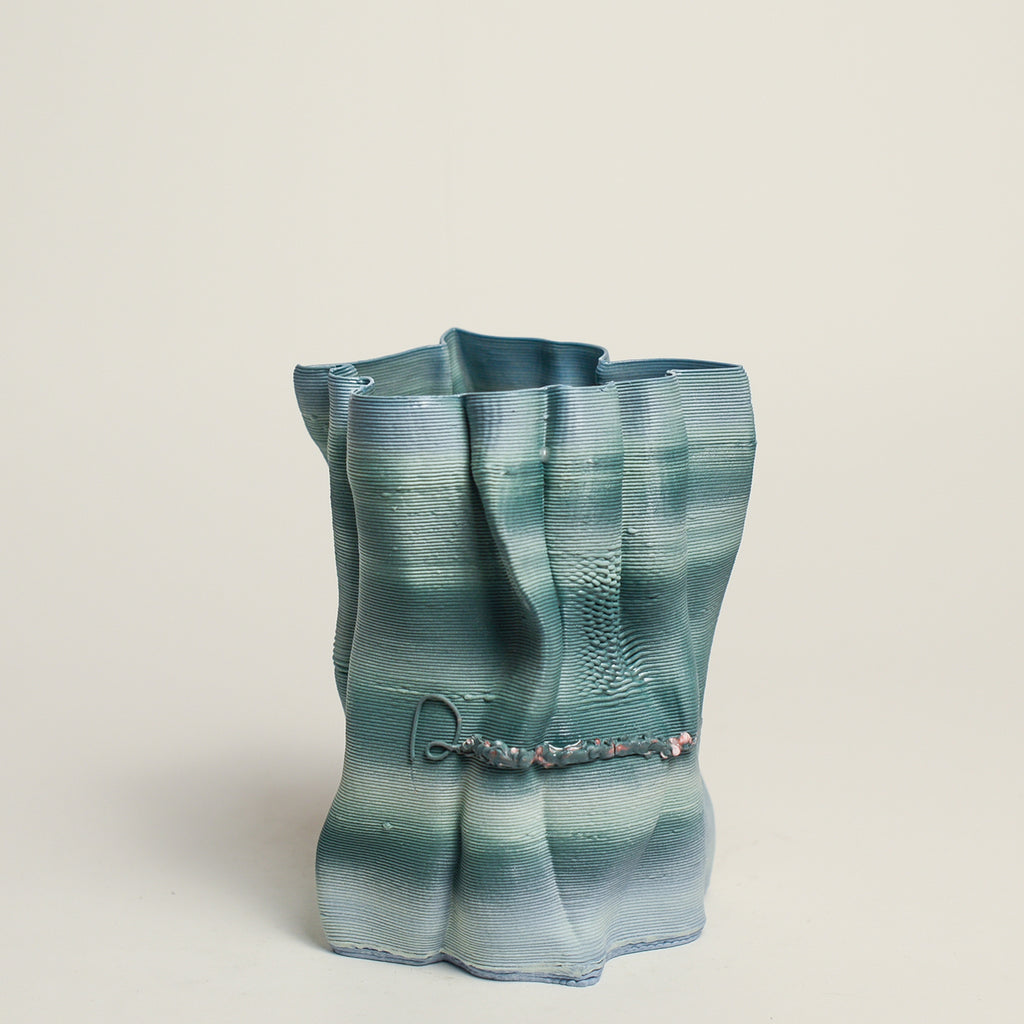 Porcelain sculpture made by Alterfact using 3D printing techniques in clay. Alterfact is an Australian duo composed of ceramicist Lucile Sciallano and designer Ben Landau based in Melbourne where they create contemporary ceramics using 3D printing techniques.