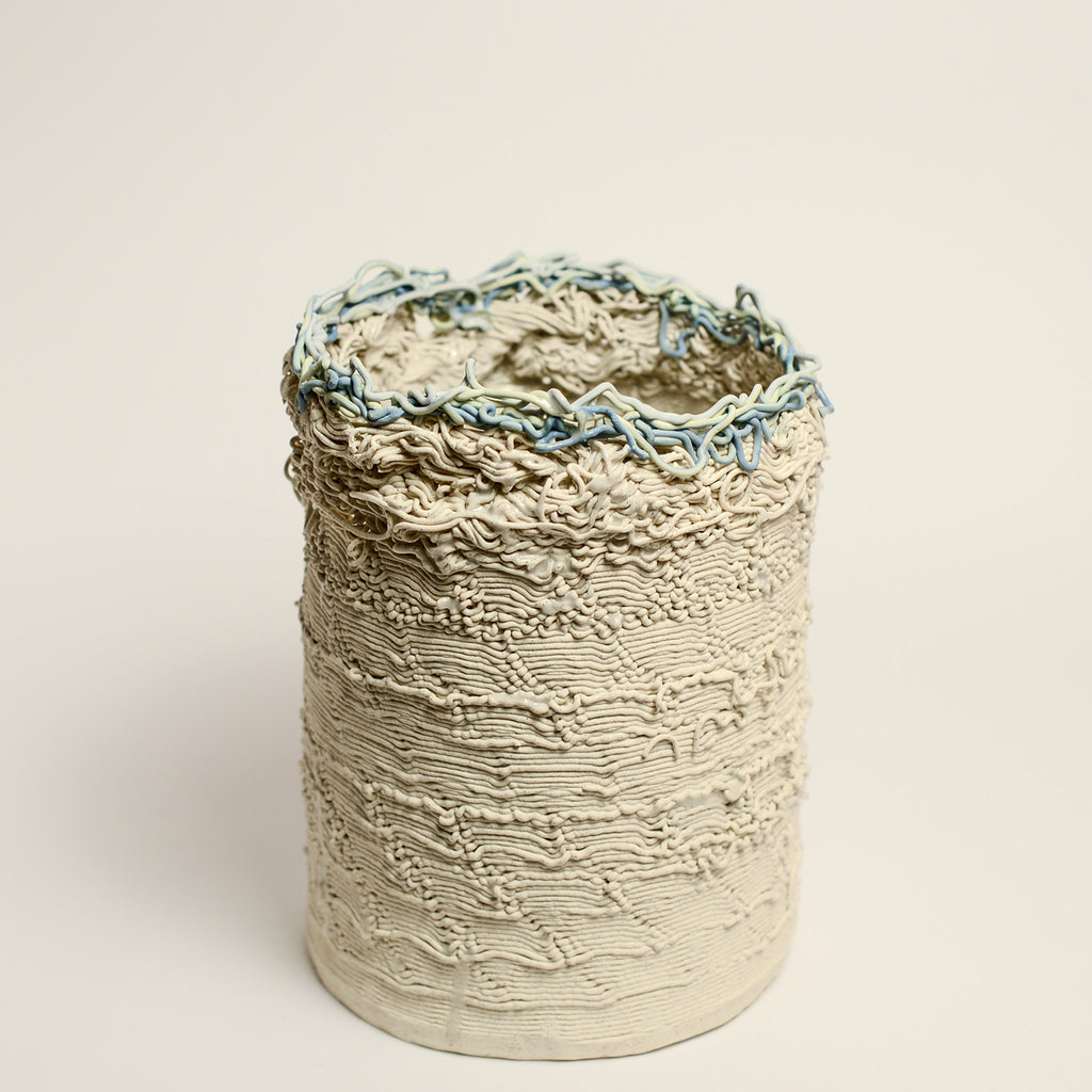 Porcelain sculpture made by Alterfact using 3D printing techniques in clay. Alterfact is an Australian duo composed of ceramicist Lucile Sciallano and designer Ben Landau based in Melbourne where they create contemporary ceramics using 3D printing techniques.