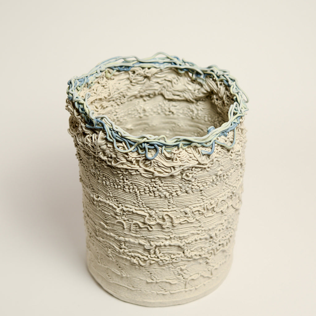 Porcelain sculpture made by Alterfact using 3D printing techniques in clay. Alterfact is an Australian duo composed of ceramicist Lucile Sciallano and designer Ben Landau based in Melbourne where they create contemporary ceramics using 3D printing techniques.