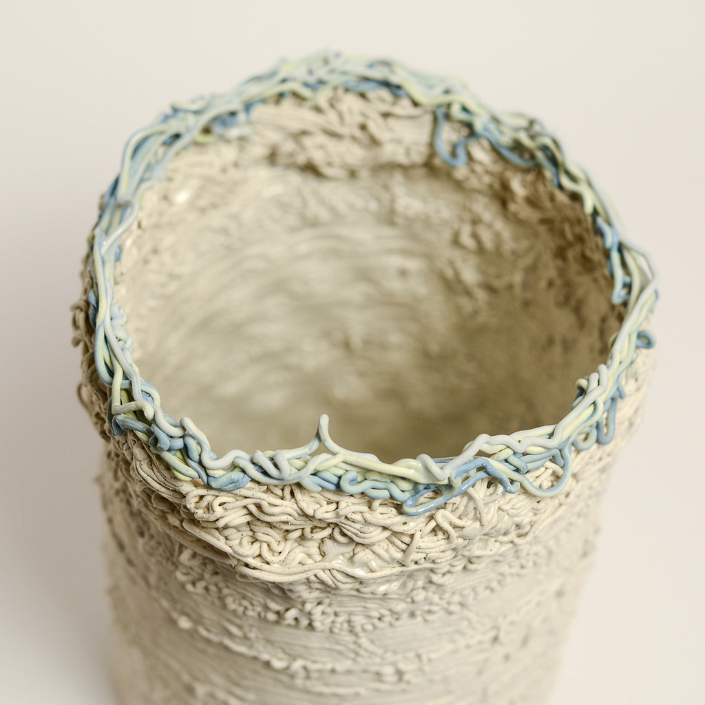 Porcelain sculpture made by Alterfact using 3D printing techniques in clay. Alterfact is an Australian duo composed of ceramicist Lucile Sciallano and designer Ben Landau based in Melbourne where they create contemporary ceramics using 3D printing techniques.