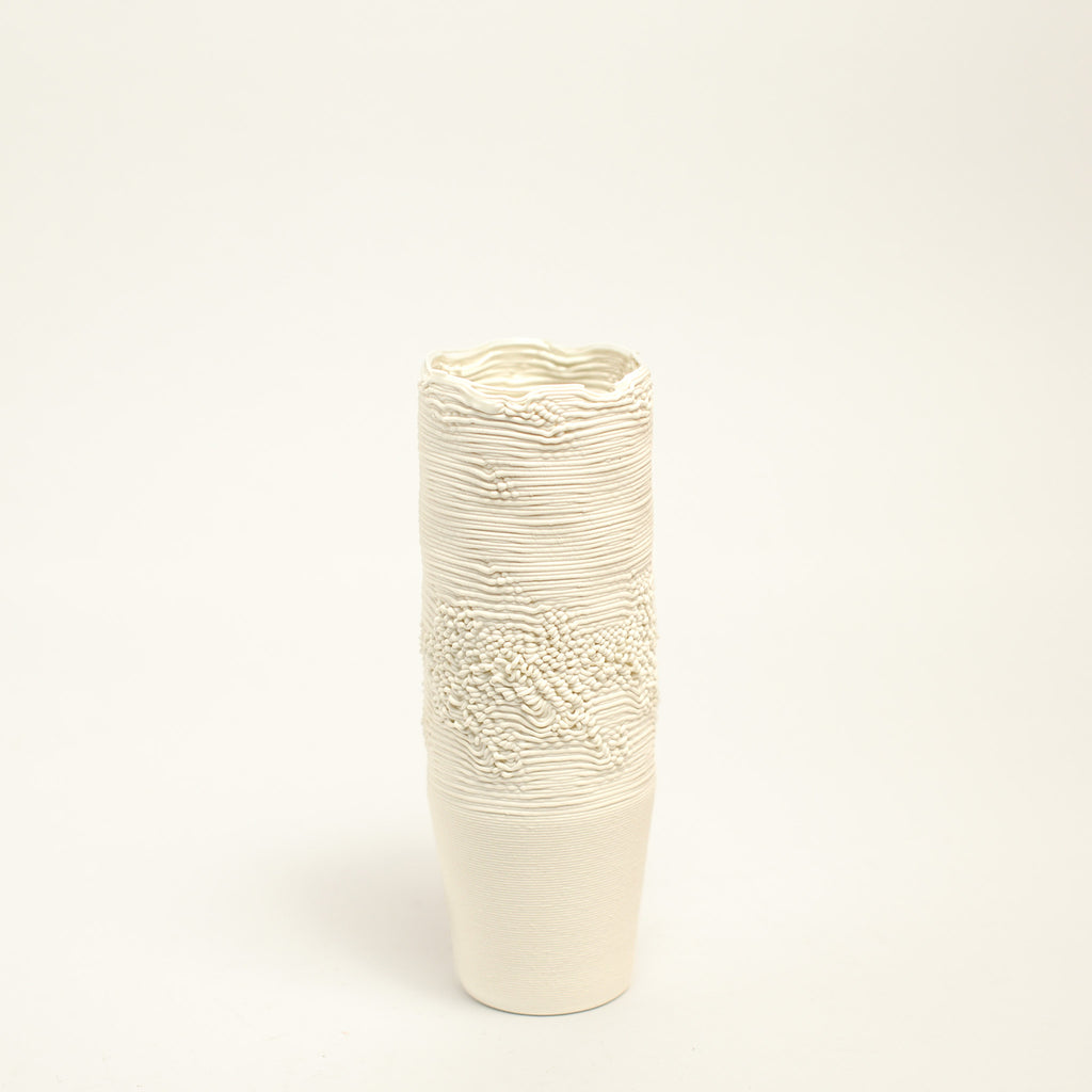 Porcelain sculpture made by Alterfact using 3D printing techniques in clay. Alterfact is an Australian duo composed of ceramicist Lucile Sciallano and designer Ben Landau based in Melbourne where they create contemporary ceramics using 3D printing techniques.