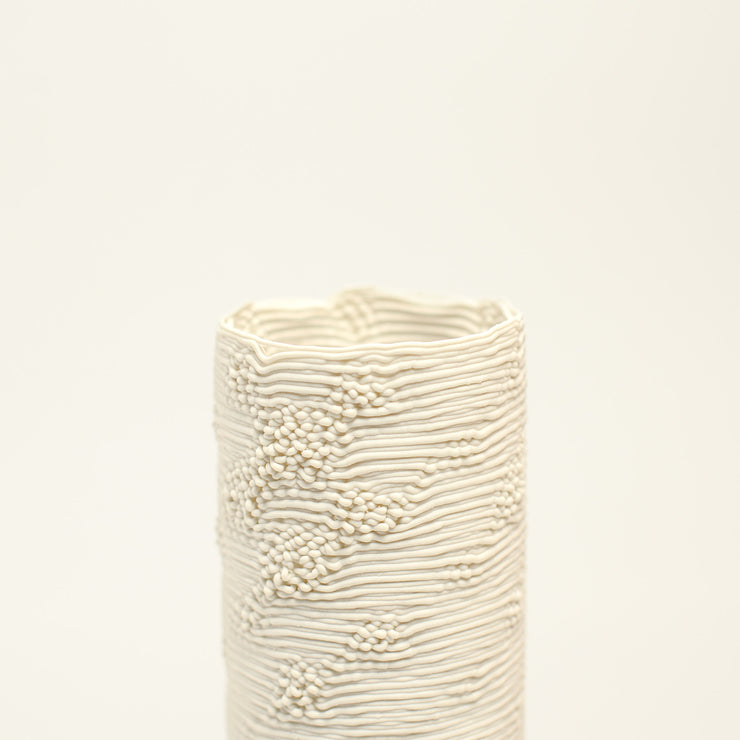 Porcelain sculpture made by Alterfact using 3D printing techniques in clay. Alterfact is an Australian duo composed of ceramicist Lucile Sciallano and designer Ben Landau based in Melbourne where they create contemporary ceramics using 3D printing techniques.
