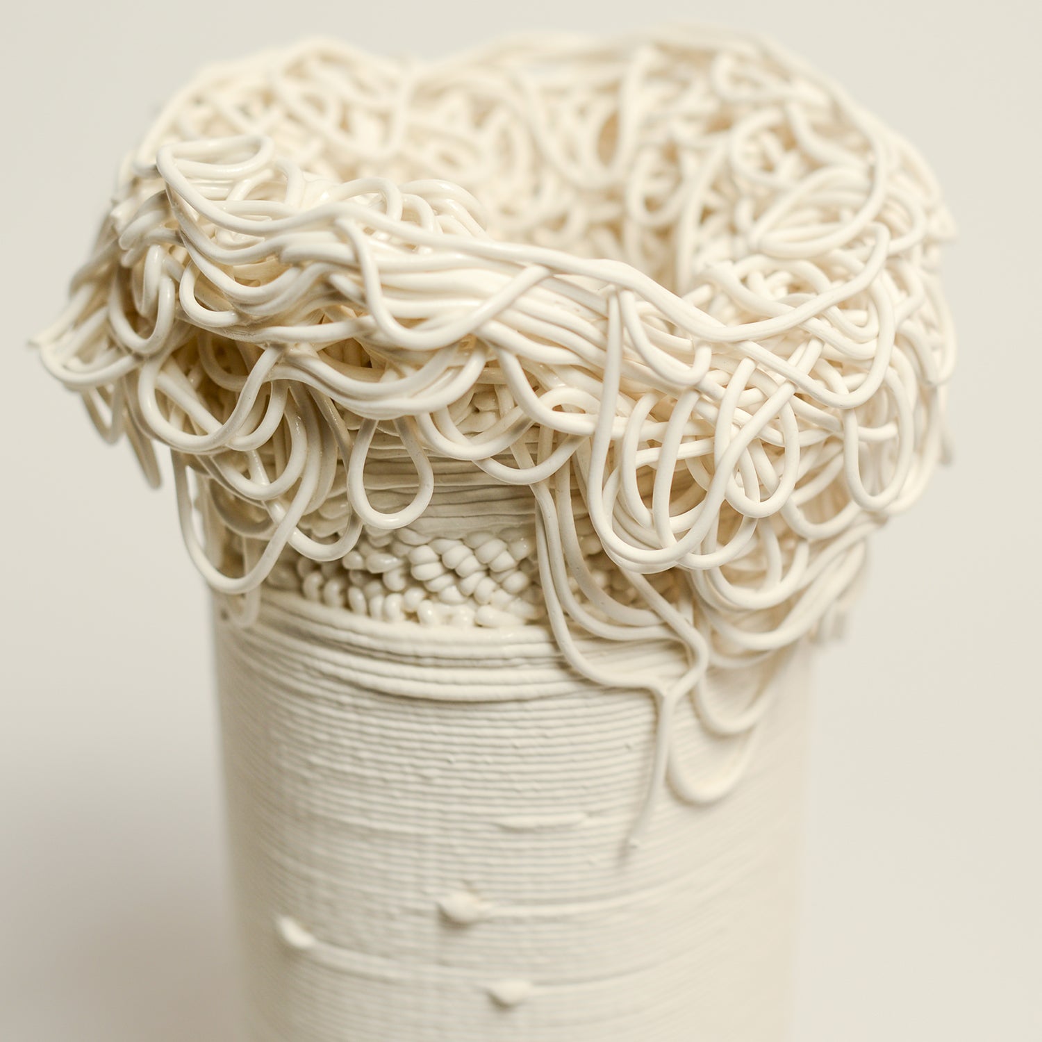 Porcelain sculpture made by Alterfact using 3D printing techniques in clay. Alterfact is an Australian duo composed of ceramicist Lucile Sciallano and designer Ben Landau based in Melbourne where they create contemporary ceramics using 3D printing techniques.