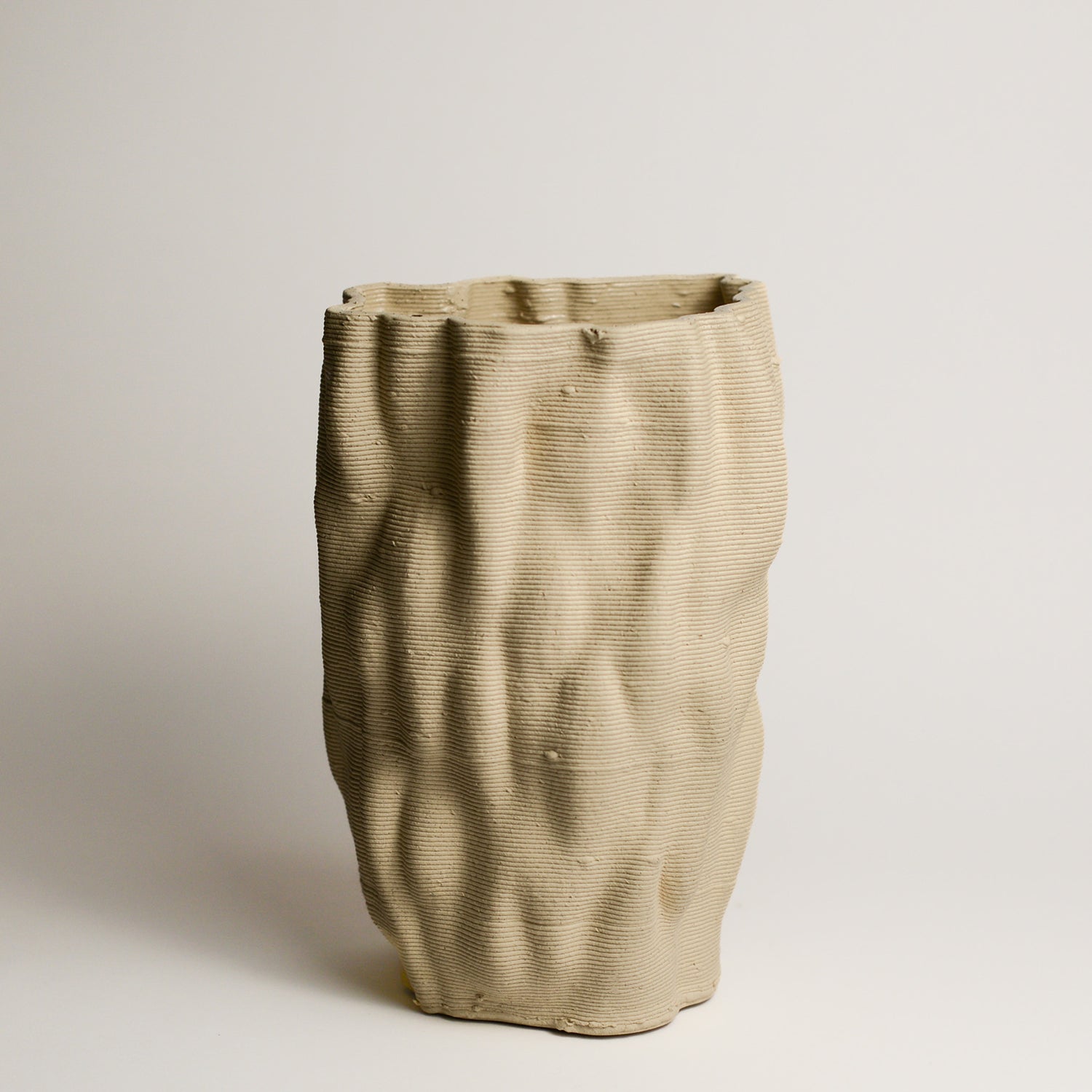 ALTERFACT is an experimental design studio created by Lucile Sciallano and Ben Landau in 2014. Alterfact’s practice is currently focused on the use of 3D printing in clay as a small batch manufacturing process. They push the boundaries of this traditionally plastic-based medium, and play with its connotations of utilitarianism and gimmickry, as it moves into a feasible reality