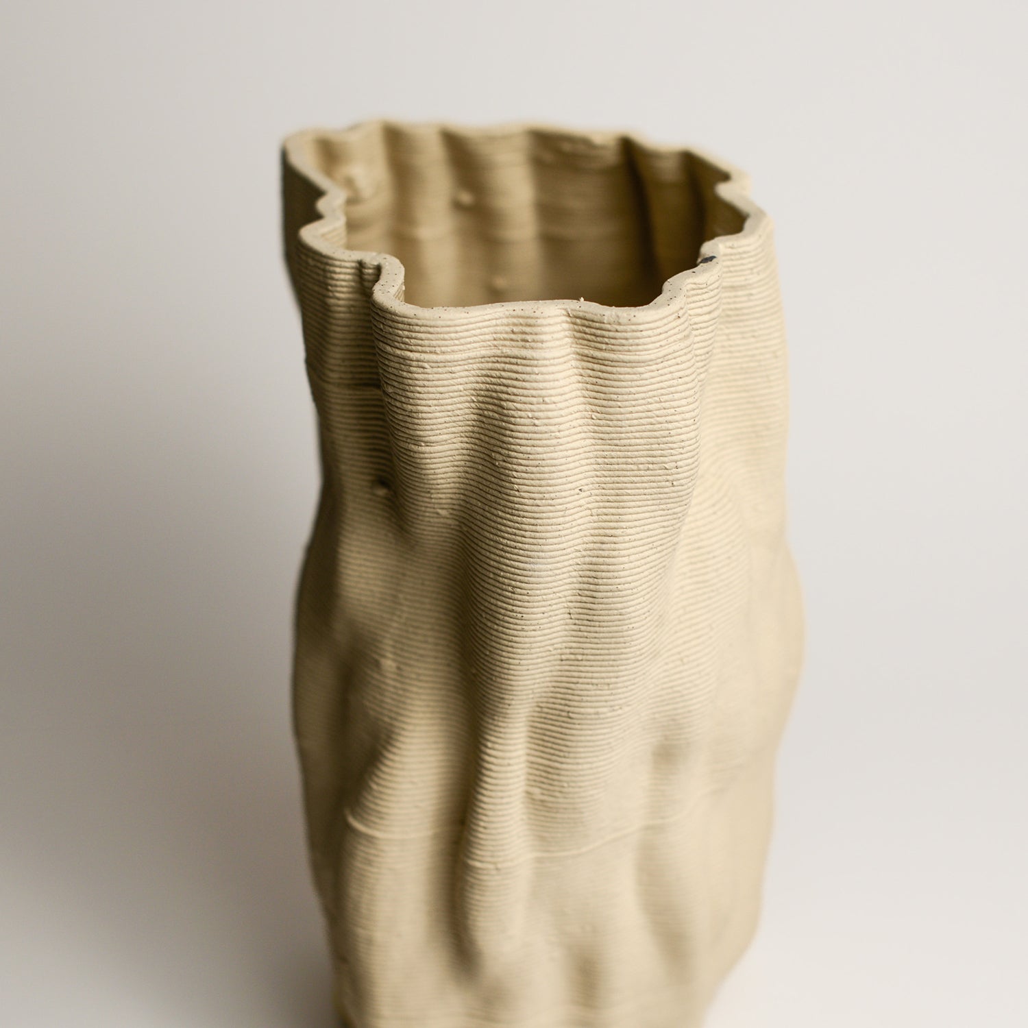 ALTERFACT is an experimental design studio created by Lucile Sciallano and Ben Landau in 2014. Alterfact’s practice is currently focused on the use of 3D printing in clay as a small batch manufacturing process. They push the boundaries of this traditionally plastic-based medium, and play with its connotations of utilitarianism and gimmickry, as it moves into a feasible reality