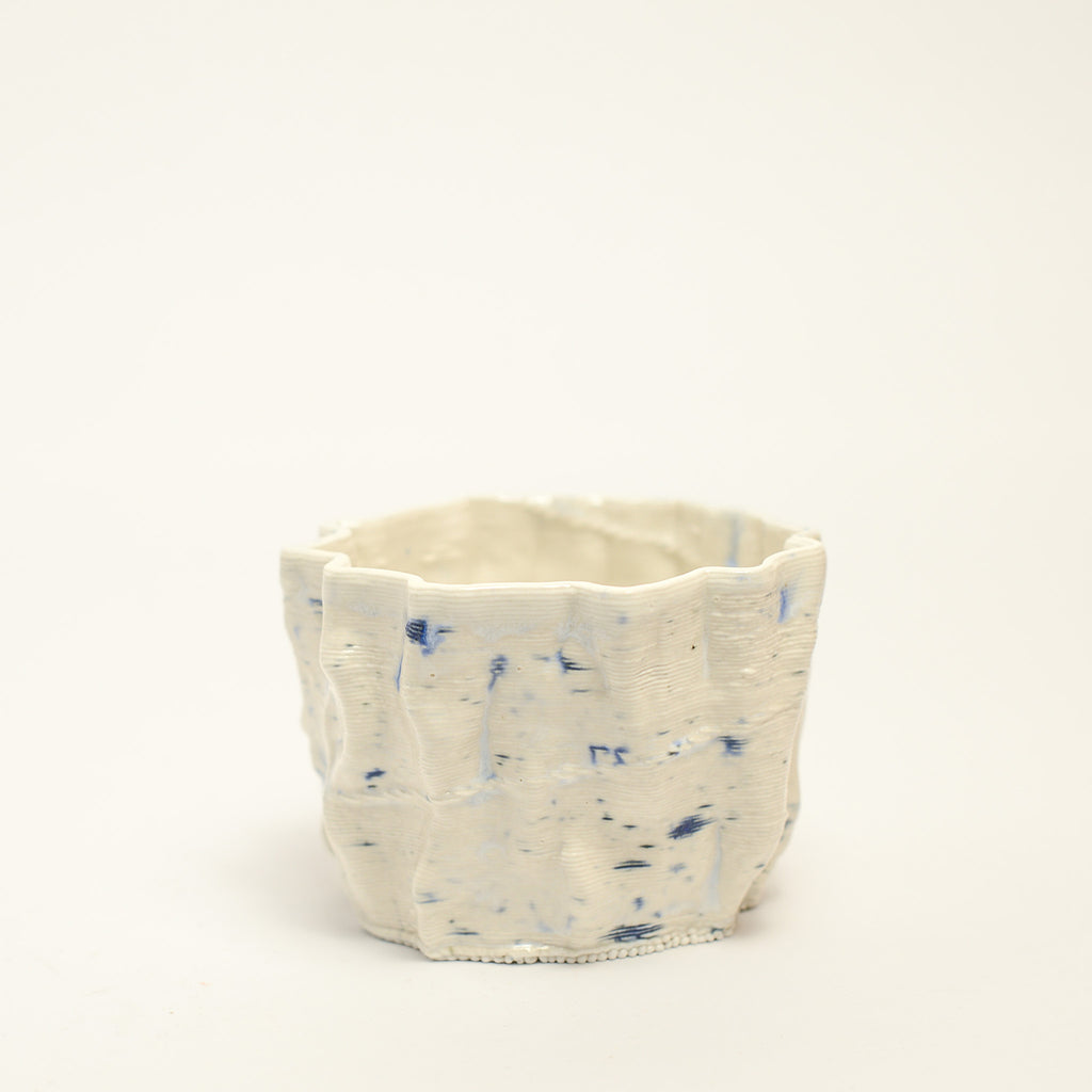 Porcelain sculpture made by Alterfact using 3D printing techniques in clay. Alterfact is an Australian duo composed of ceramicist Lucile Sciallano and designer Ben Landau based in Melbourne where they create contemporary ceramics using 3D printing techniques.