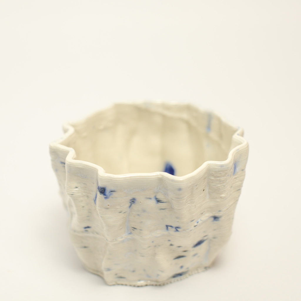 Porcelain sculpture made by Alterfact using 3D printing techniques in clay. Alterfact is an Australian duo composed of ceramicist Lucile Sciallano and designer Ben Landau based in Melbourne where they create contemporary ceramics using 3D printing techniques.