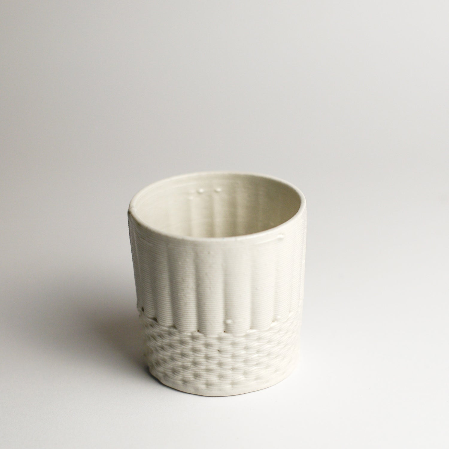 ALTERFACT is an experimental design studio created by Lucile Sciallano and Ben Landau in 2014. Alterfact’s practice is currently focused on the use of 3D printing in clay as a small batch manufacturing process. They push the boundaries of this traditionally plastic-based medium, and play with its connotations of utilitarianism and gimmickry, as it moves into a feasible reality