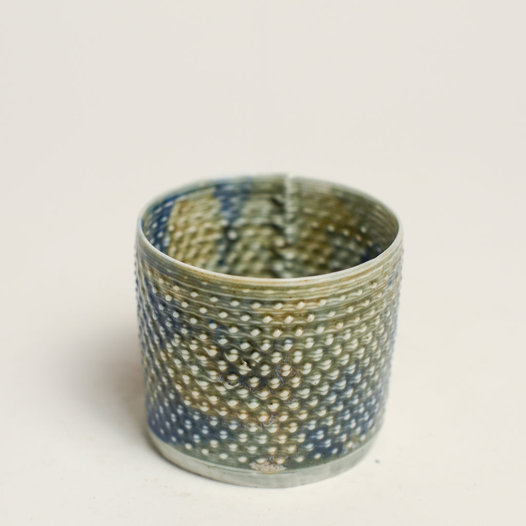 Porcelain sculpture made by Alterfact using 3D printing techniques in clay. Alterfact is an Australian duo composed of ceramicist Lucile Sciallano and designer Ben Landau based in Melbourne where they create contemporary ceramics using 3D printing techniques.