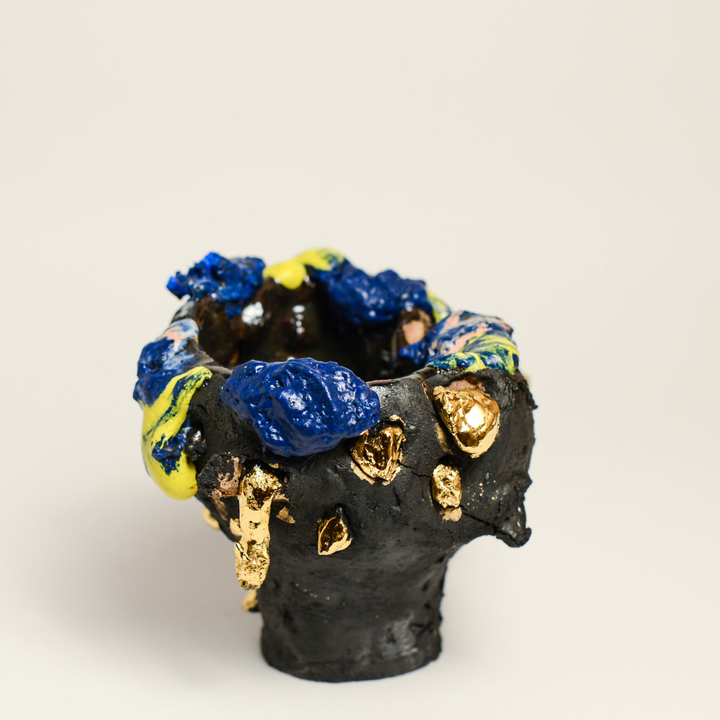 ANNA PARSONS is a ceramicist, working intuitively, finding clay a receptive medium to express herself. Anna often incorporates additions from the bush from where Anna lives. Anna fires her work numerous times, sometimes up to 5 firings to get the desired effects. Anna majored in sculpture at  BA Sydney College of the Arts and now lives in Rosebank, NSW.