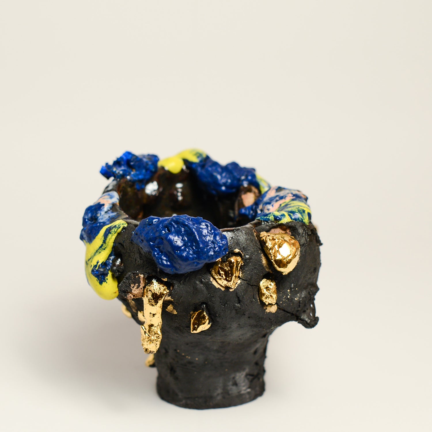 ANNA PARSONS is a ceramicist, working intuitively, finding clay a receptive medium to express herself. Anna often incorporates additions from the bush from where Anna lives. Anna fires her work numerous times, sometimes up to 5 firings to get the desired effects. Anna majored in sculpture at  BA Sydney College of the Arts and now lives in Rosebank, NSW.