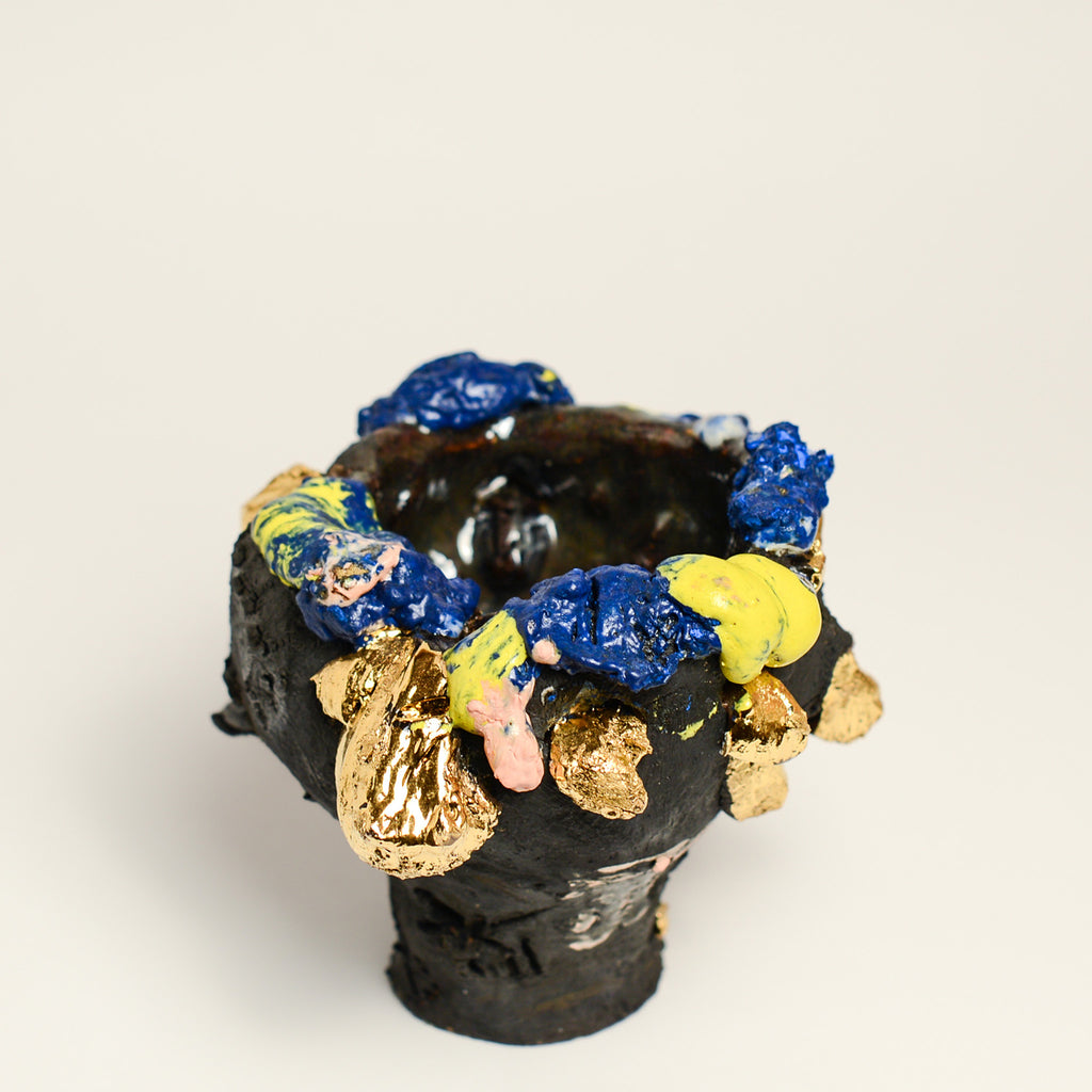 ANNA PARSONS is a ceramicist, working intuitively, finding clay a receptive medium to express herself. Anna often incorporates additions from the bush from where Anna lives. Anna fires her work numerous times, sometimes up to 5 firings to get the desired effects. Anna majored in sculpture at  BA Sydney College of the Arts and now lives in Rosebank, NSW.