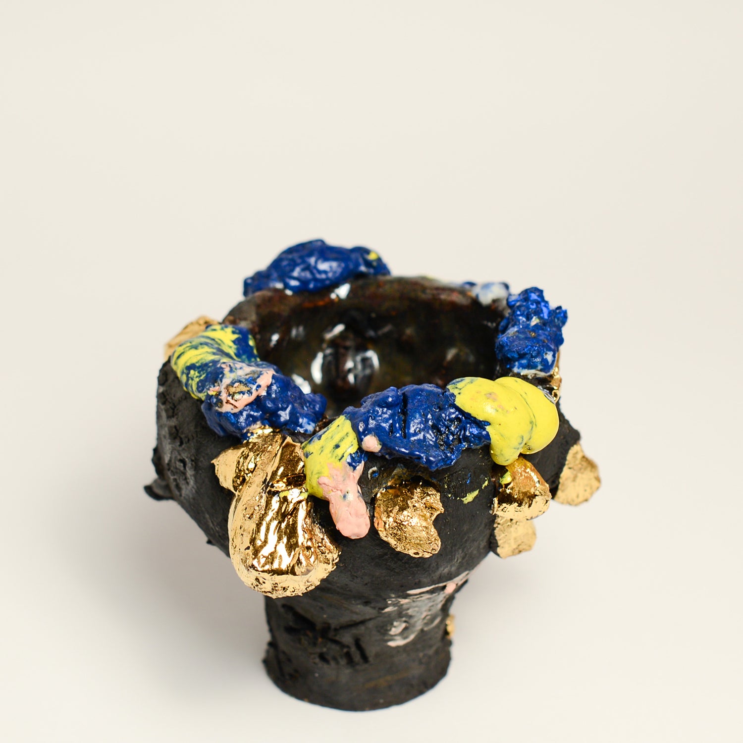 ANNA PARSONS is a ceramicist, working intuitively, finding clay a receptive medium to express herself. Anna often incorporates additions from the bush from where Anna lives. Anna fires her work numerous times, sometimes up to 5 firings to get the desired effects. Anna majored in sculpture at  BA Sydney College of the Arts and now lives in Rosebank, NSW.