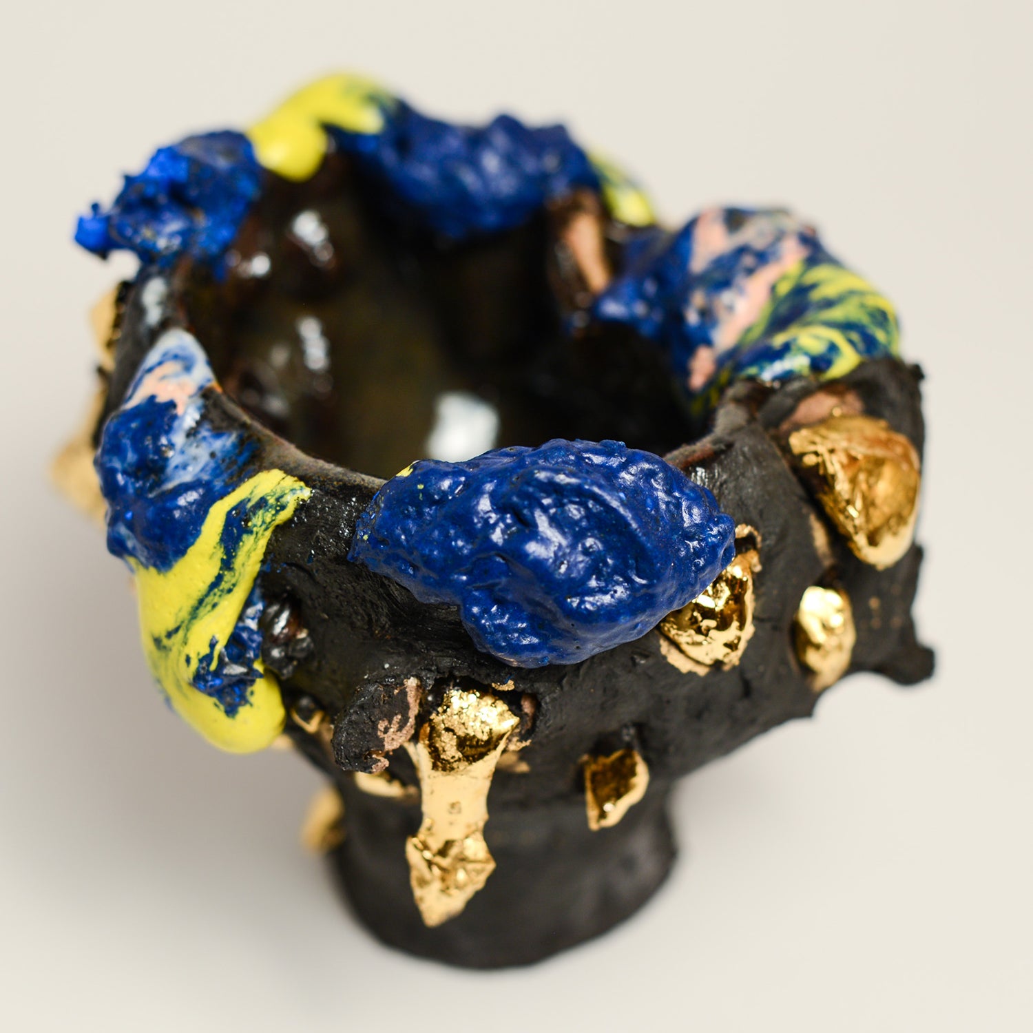 ANNA PARSONS is a ceramicist, working intuitively, finding clay a receptive medium to express herself. Anna often incorporates additions from the bush from where Anna lives. Anna fires her work numerous times, sometimes up to 5 firings to get the desired effects. Anna majored in sculpture at  BA Sydney College of the Arts and now lives in Rosebank, NSW.