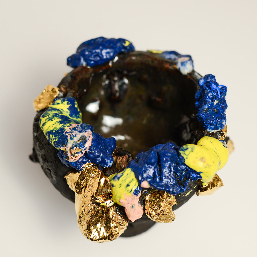 ANNA PARSONS is a ceramicist, working intuitively, finding clay a receptive medium to express herself. Anna often incorporates additions from the bush from where Anna lives. Anna fires her work numerous times, sometimes up to 5 firings to get the desired effects. Anna majored in sculpture at  BA Sydney College of the Arts and now lives in Rosebank, NSW.